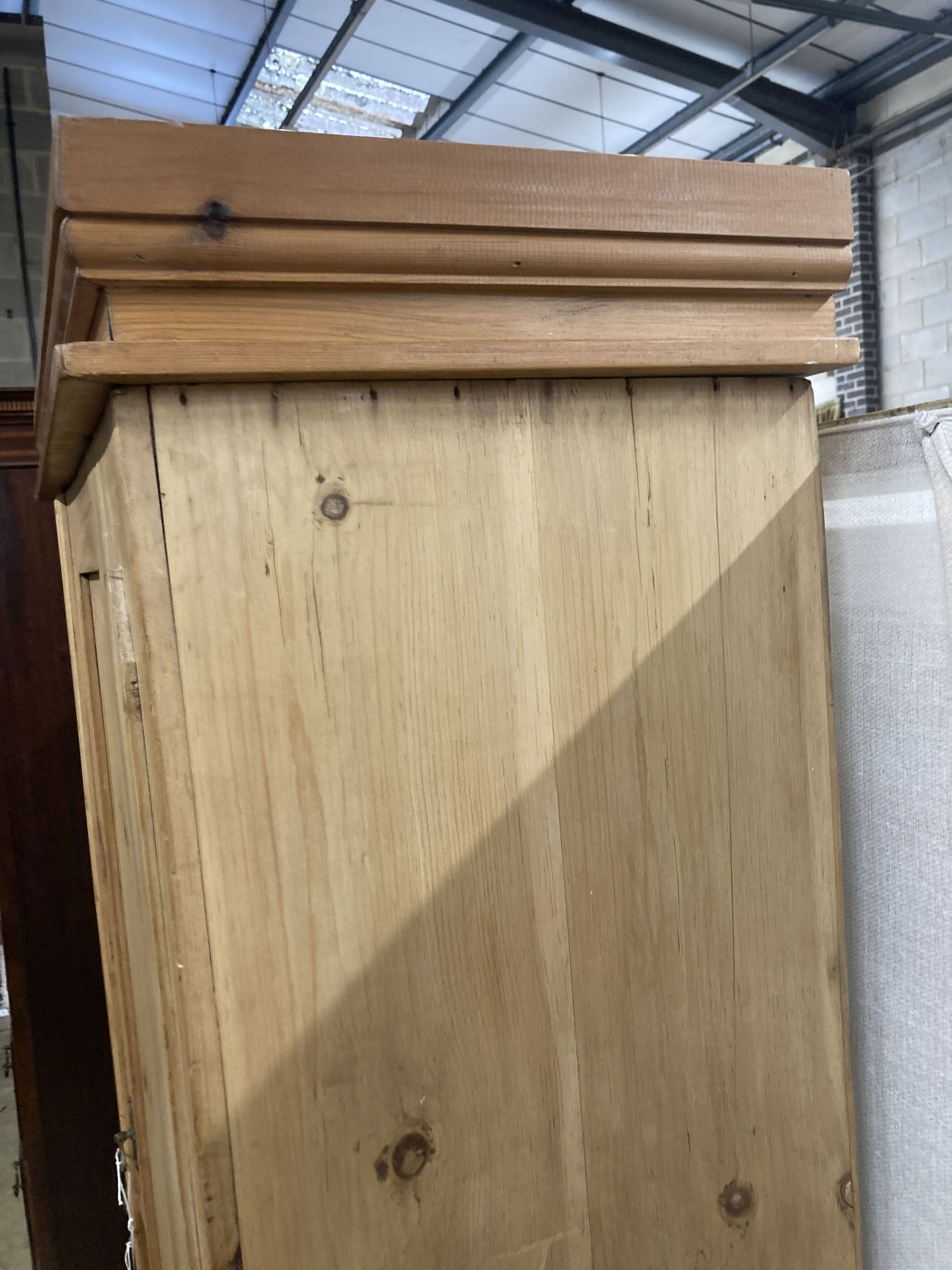 A Victorian pine single door wardrobe, width 79cm, depth 42cm, height 193cm